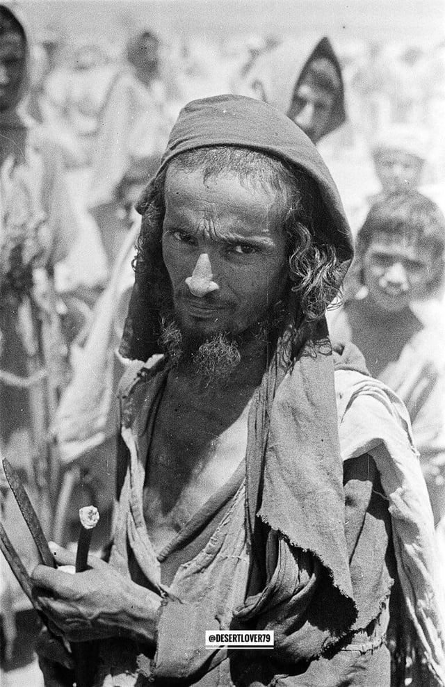A jewish man standing in the crowd at the Souq Khamis (Thursday Market) in the town of Najran in Saudi Arabia, 1947. [777x1200]