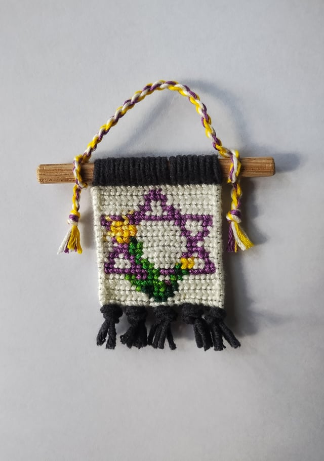 I'm not Jewish myself but I made this little wallhanging as a gift for someone who is - Star of David and flowers